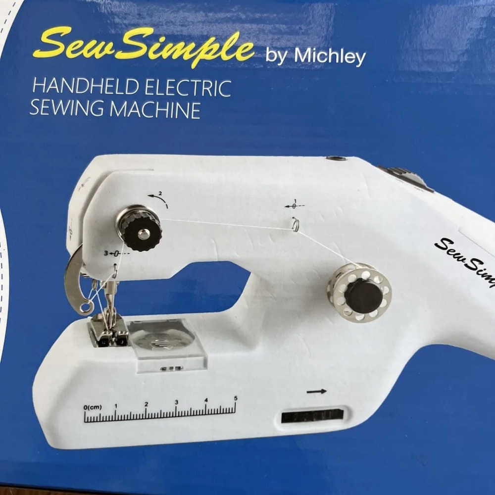 Handheld electric sewing machine